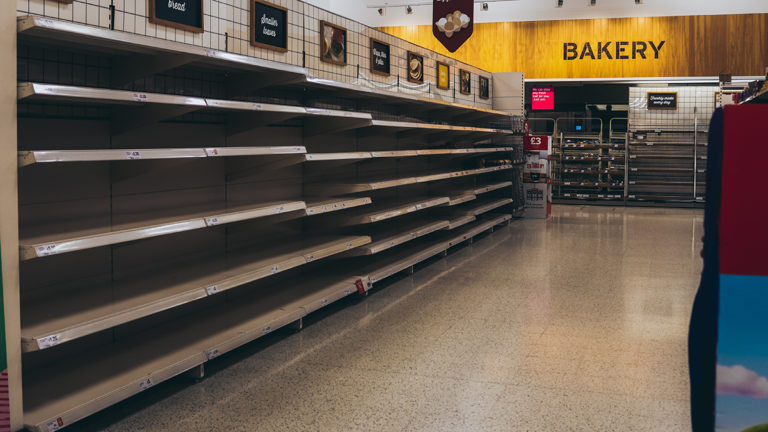 Empty grocery store shelves in the wake of the COVID-19 pandemic