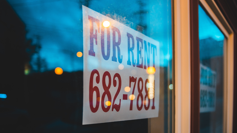 For rent sign in the window
